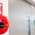 Fire alarm on the wall.
